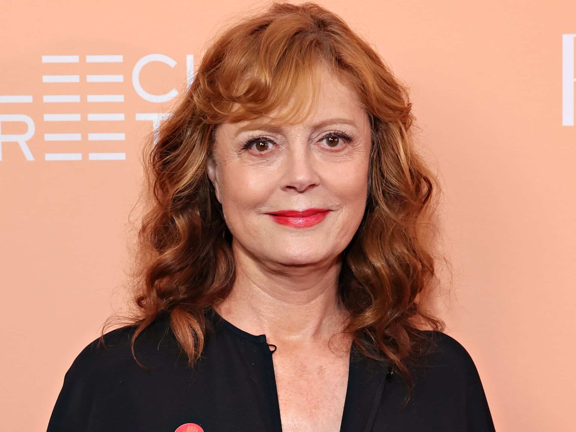 Susan Sarandon is a vision in all white as she cozies up to dashing A-lister | HELLO!
