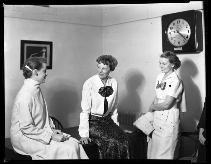 Primary view of object titled '[Amelia Earhart and two unidentified women at TSCW]'.
