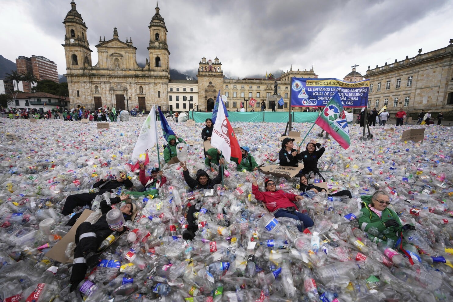 Colombian waste pickers inundate Bogota square with plastic bottles | AP  News