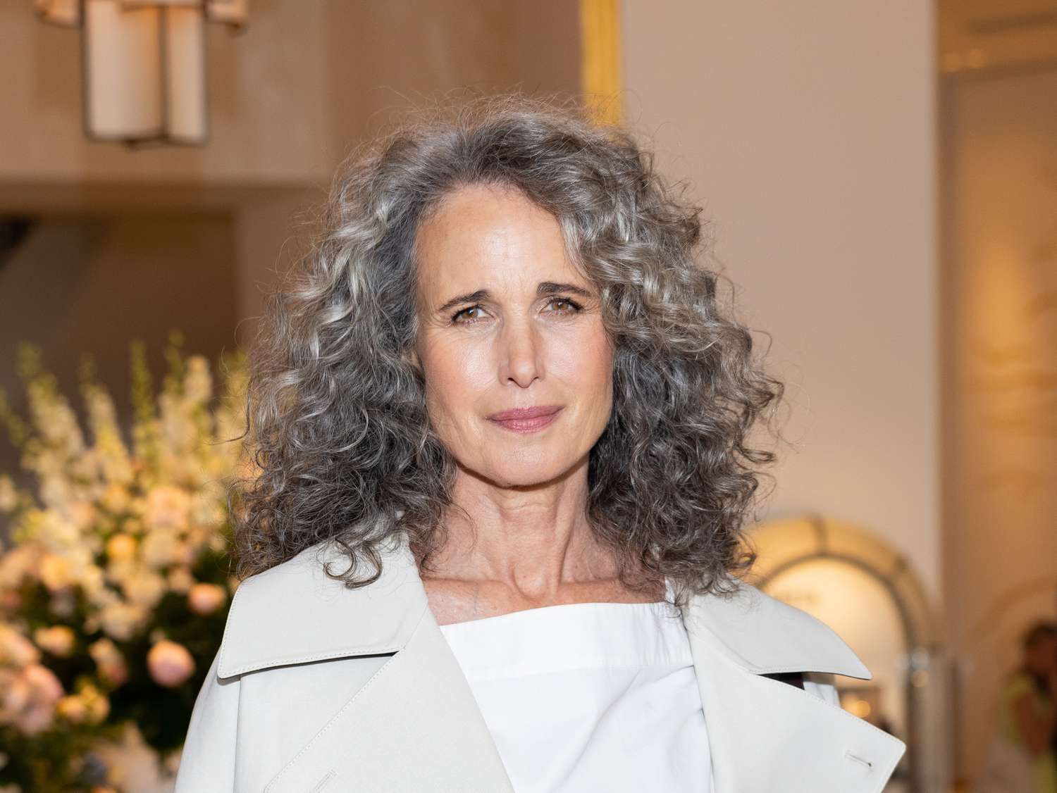 Andie MacDowell Trades in Curls for a Sleek Updo With Side Bangs