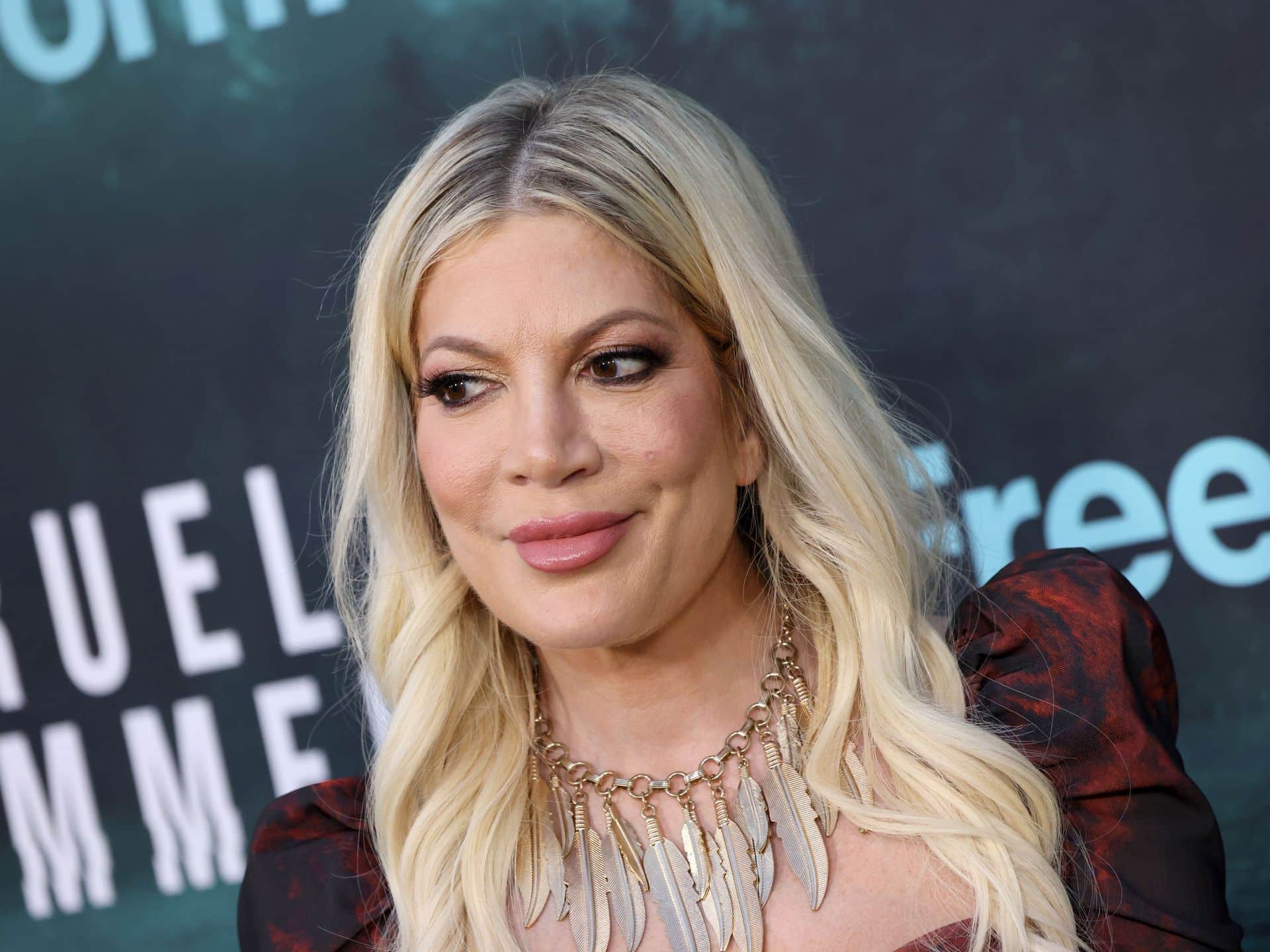 Tori Spelling shocks fans with pre-plastic surgery photo and she looks so  different | HELLO!
