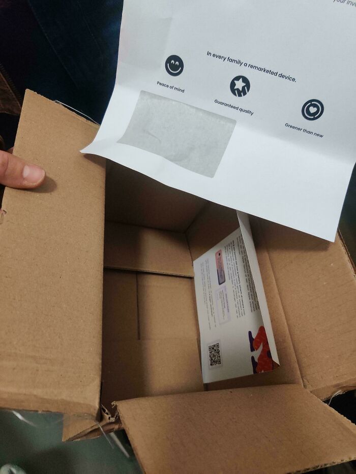 Empty cardboard box with product information papers inside, illustrating careless online shopping backfired moments. Empty cardboard box with product information papers inside, illustrating careless online shopping backfired moments.