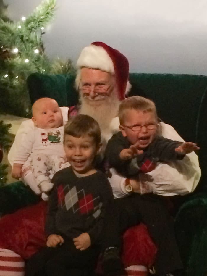 Children posing with Santa, creating a funny Christmas card moment. Children posing with Santa, creating a funny Christmas card moment.