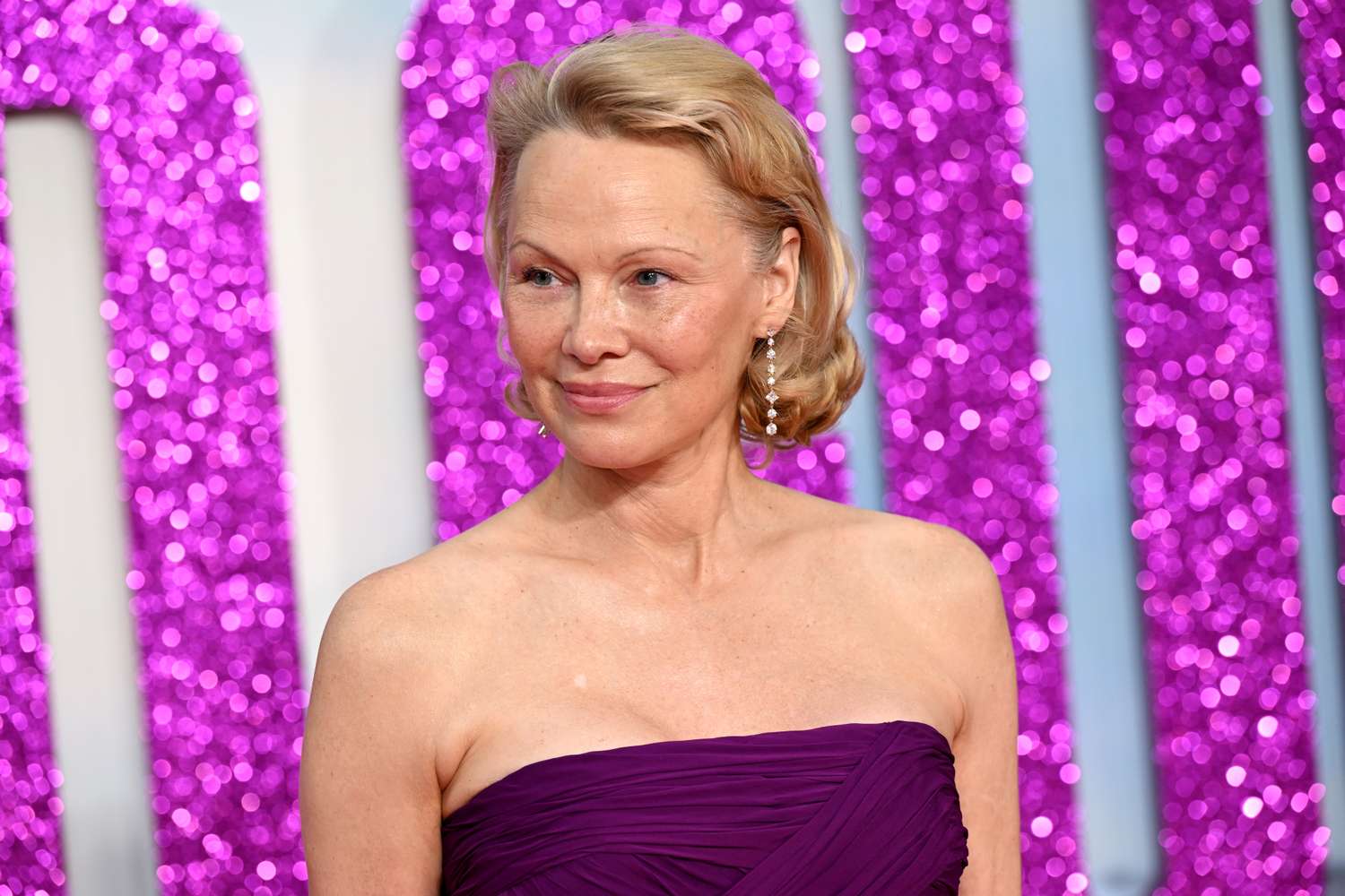 Pamela Anderson Wears $20,000 Vintage Diamond and Emerald Earrings