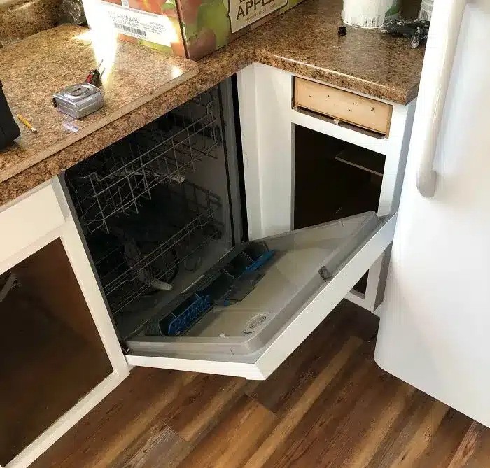 Just Putting The Last Touches On A Kitchen Renovation. New Dishwasher And Fridge Are Great!